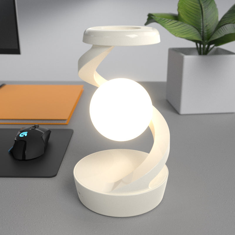 Rotating Suspension Wireless Mobile Phone Charging Lamp